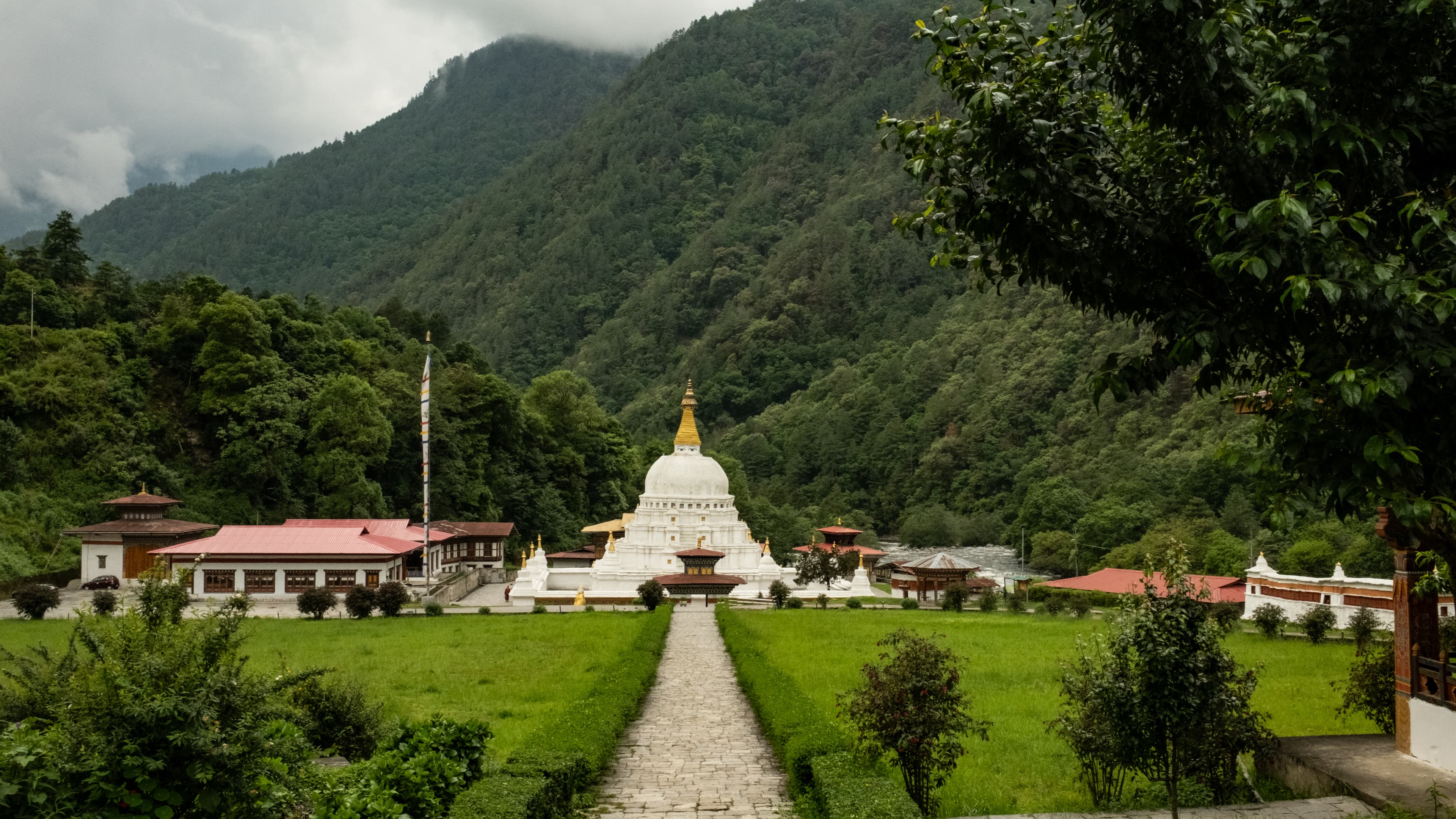 Pilgrims circumambulating Yangtse Chorten Kora, one of eastern Bhutan’s most sacred stupas